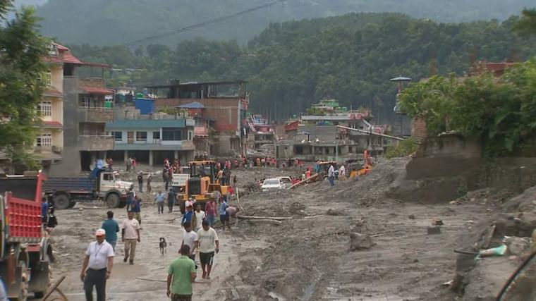 Race to rescue 900 trapped workers as floodwaters recede in Nepal