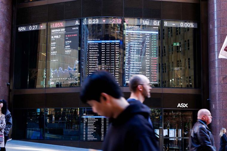 ASX slides as rising oil price fuels rate hike bets; Big four banks fall