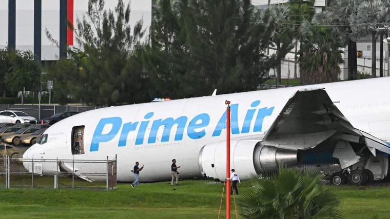 Five killed after Amazon cargo plane barrels off runway, hits vehicles