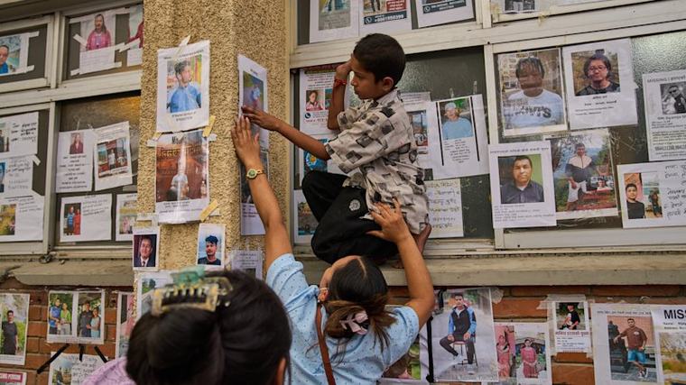 ‘My heart is aching’: Wall of the missing lays bare desperate race to find Nepal victims