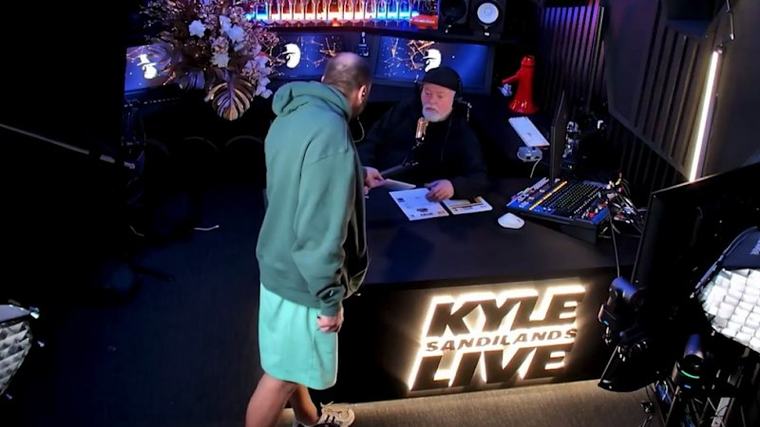 Kyle Sandilands served with subpoena papers live on-air
